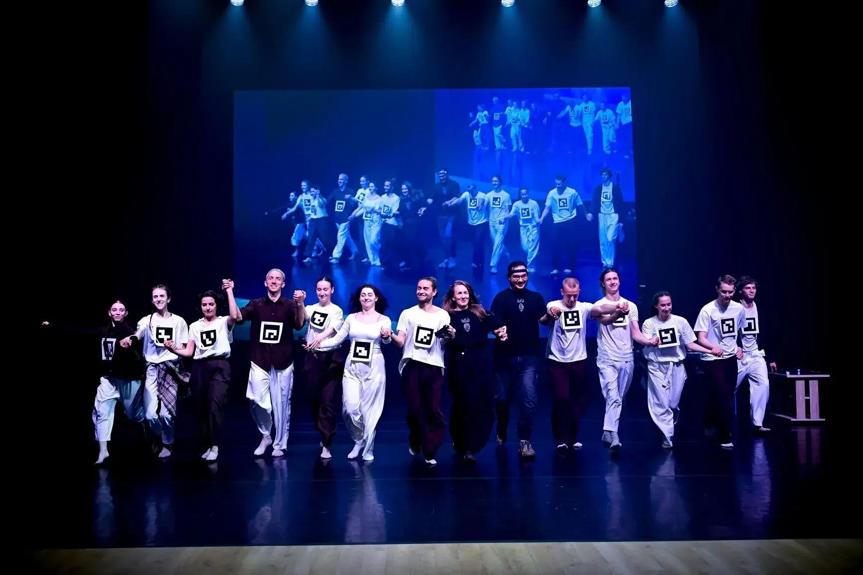 Performers on stage during Interference of Realities